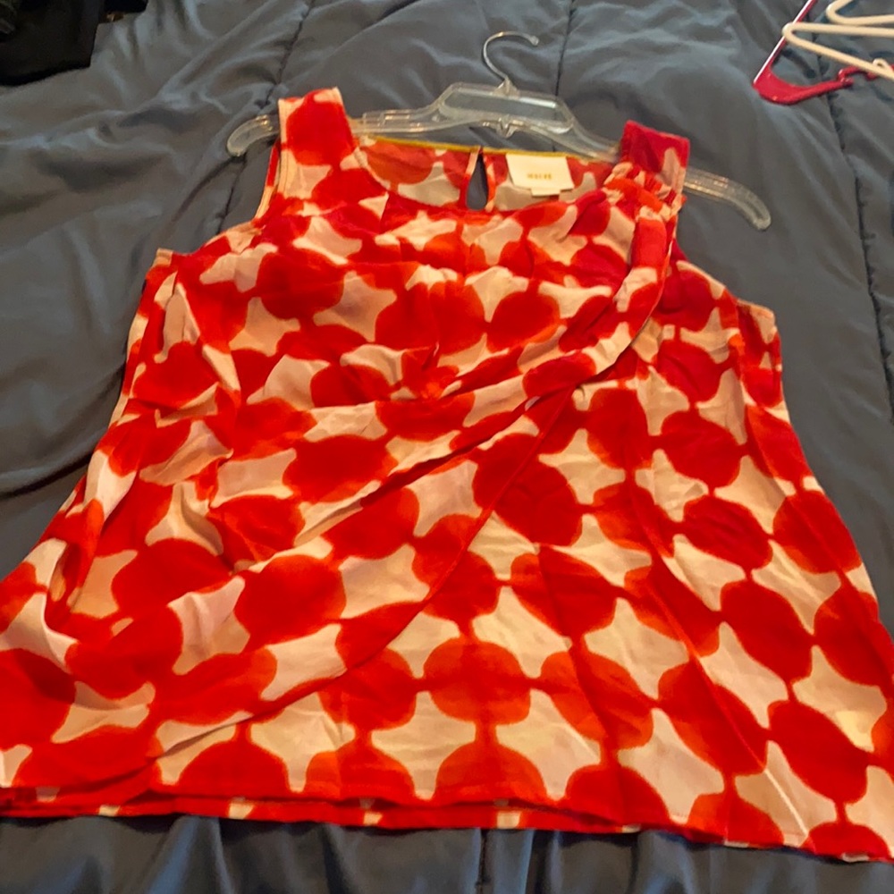 Cute, cute, cute.  Sleeveless crepe top.